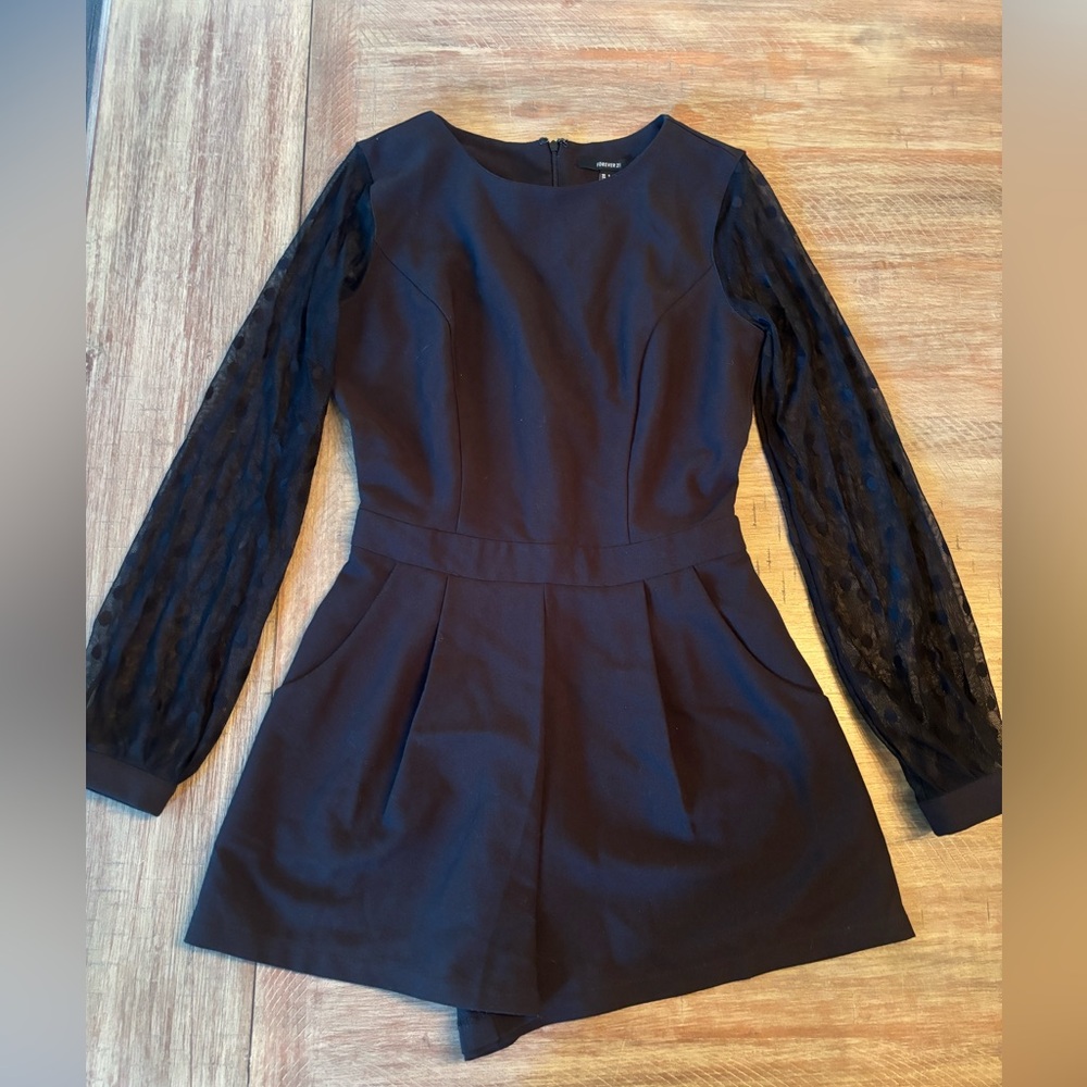 Black long sleeve small romper from Forever 21